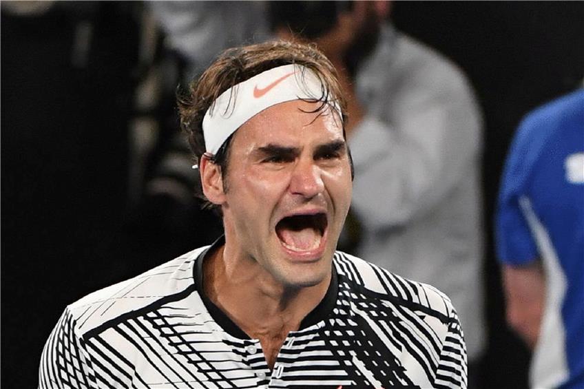 Matchball verwandelt: Roger Federer ließ nach dem Triumph in Melbourne seinen Emotionen freien Lauf. Foto: afp
